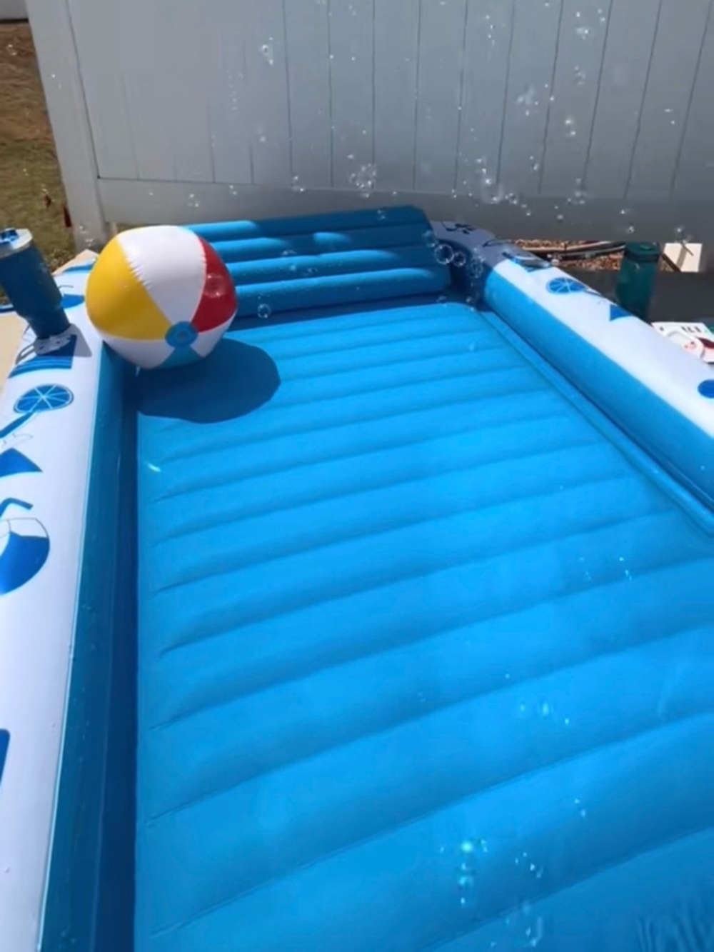 Tanning Blue Inflatable Rectangular Pool Float with Pineapple Graphics - Picture 2 of 3